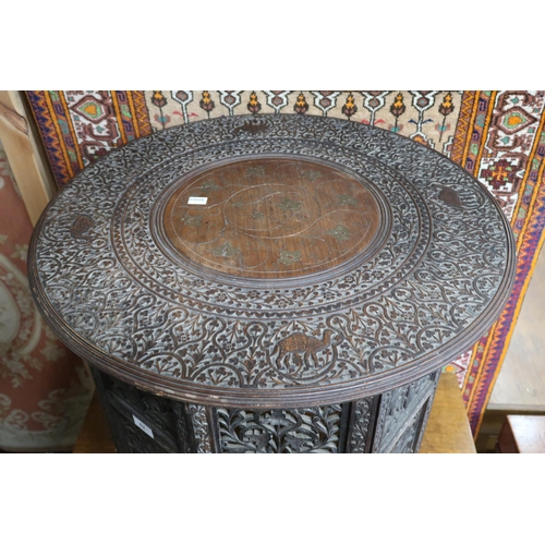 62 - A 20th century Anglo-Indian hardwood circular topped occasional table with carved brass inlaid top o... 