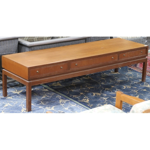 82 - A mid 20th century teak Greaves & Thomas coffee table with three drawers on square supports, 41c... 