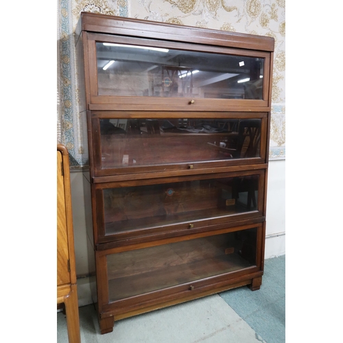 93 - A 20th century mahogany Globe Wernicke sectional bookcase with four glazed lift front sections, 125c... 