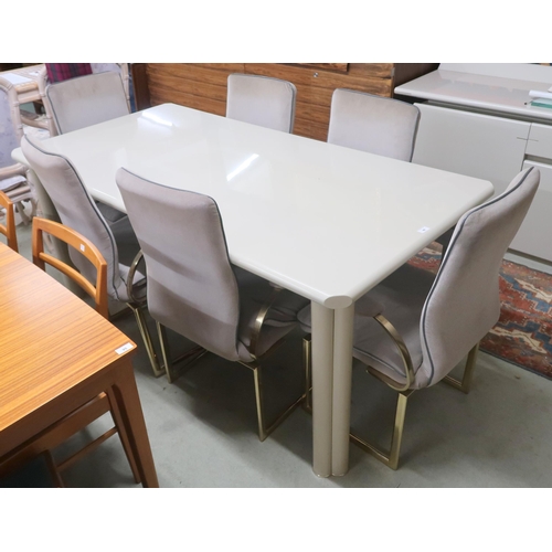 99 - A mid to late 20th century lacquered dining table and six gilt metal framed upholstered dining chair... 