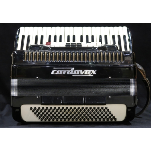 427 - CORDOVOX a Cordovox 120 bass 41 key piano accordion with case In 1962, a Farfisa technical team... 