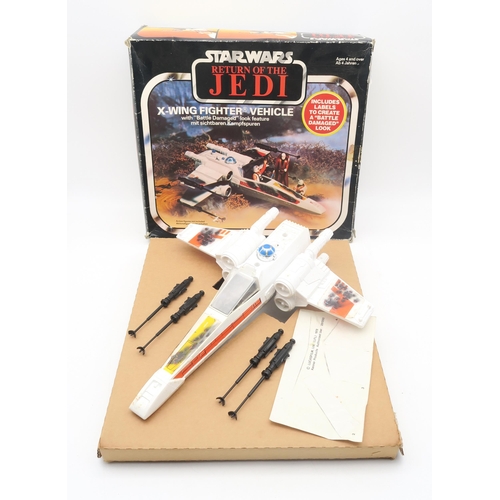 541 - A boxed Palitoy Star Wars Return of the Jedi X-Wing Fighter Vehicle; together with a Scout Walker Ve... 