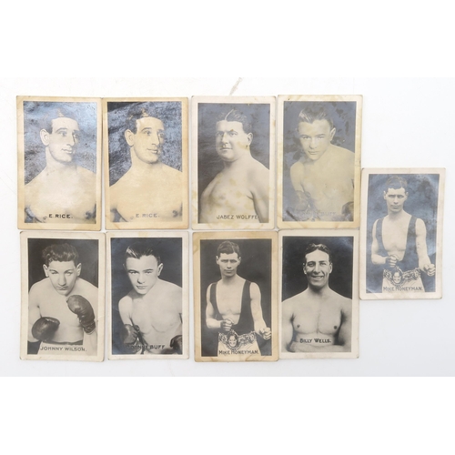 561 - A quantity of football, boxing and cricket photographic collectors' cards, circa-1920s, issued by bo... 