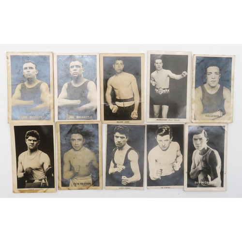 561 - A quantity of football, boxing and cricket photographic collectors' cards, circa-1920s, issued by bo... 