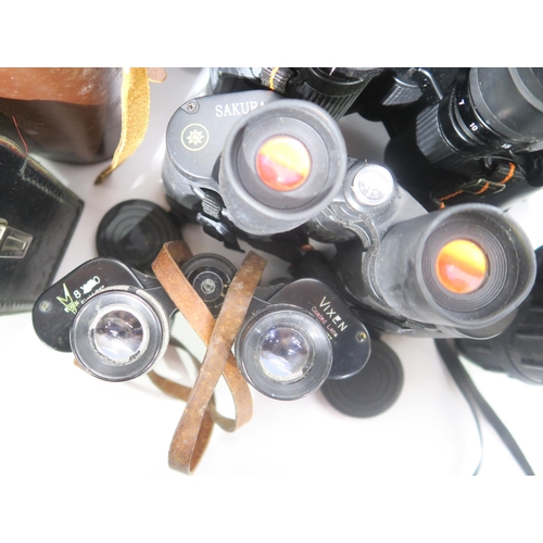 592 - Assorted binoculars and binocular cases, to include a black leather Carl Zeiss case stamped with Ger... 