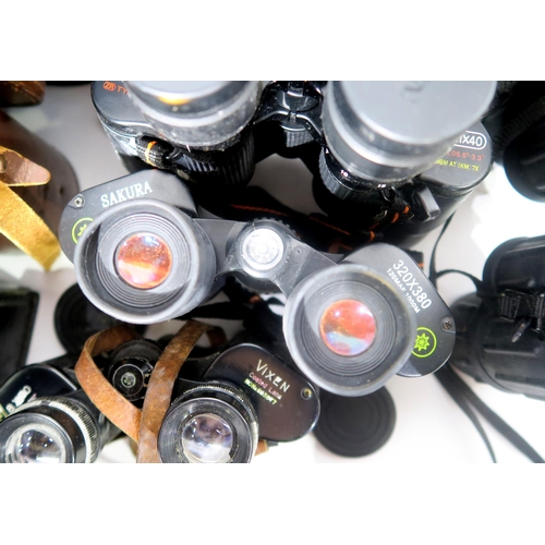 592 - Assorted binoculars and binocular cases, to include a black leather Carl Zeiss case stamped with Ger... 