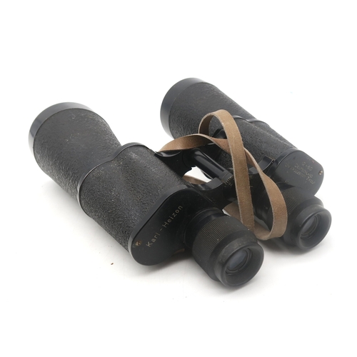 594 - Assorted binoculars, to include a pair of 