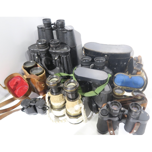 594 - Assorted binoculars, to include a pair of 