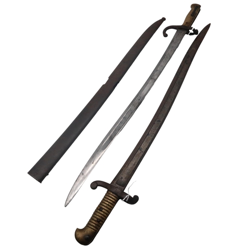 599 - A French M1842 bayonet and an M1866 Chassepot bayonet with scabbard (2)