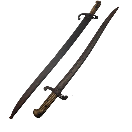 599 - A French M1842 bayonet and an M1866 Chassepot bayonet with scabbard (2)