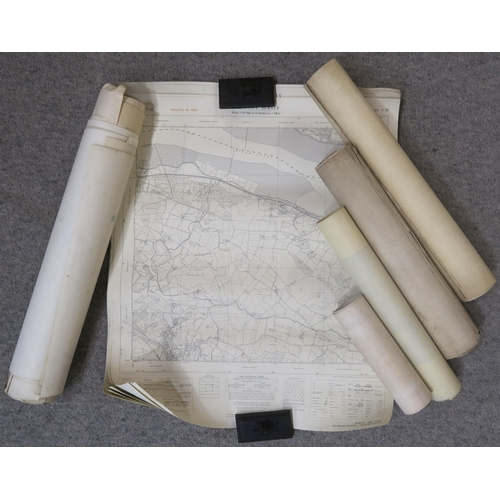 617 - A quantity of unframed Ordnance Survey maps, a small quantity of unframed signed etchings etc.