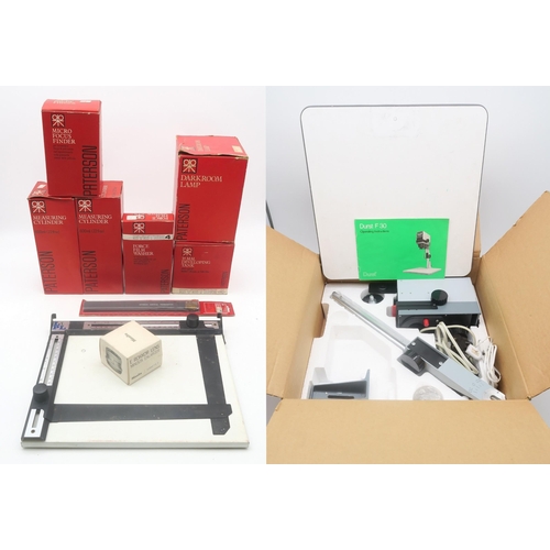 628 - A boxed Durst F30 darkroom enlarger, together with a quantity of a further boxed photographic develo... 