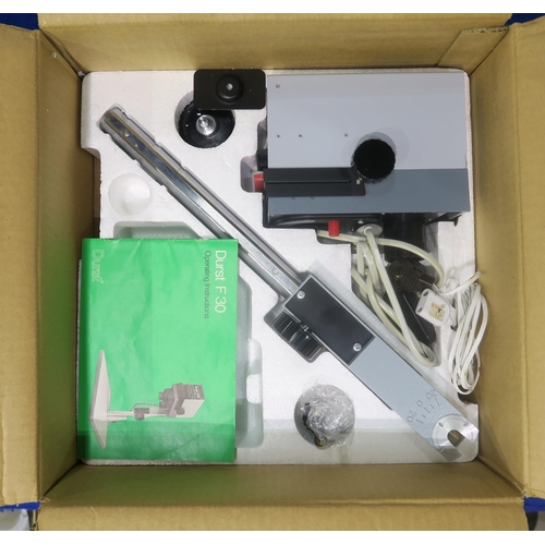 628 - A boxed Durst F30 darkroom enlarger, together with a quantity of a further boxed photographic develo... 