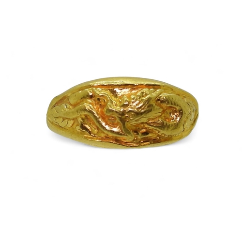 773 - A bright yellow metal dragon ring, stamped with Chinese characters, and 96.5%, size R1/2, weight 3.7... 