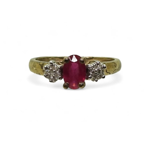 774 - A 9ct gold ruby and diamond cluster ring, size I1/2, weight 1.5gms