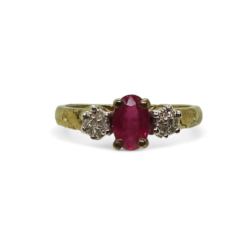 774 - A 9ct gold ruby and diamond cluster ring, size I1/2, weight 1.5gms