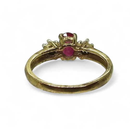 774 - A 9ct gold ruby and diamond cluster ring, size I1/2, weight 1.5gms