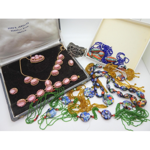 943 - Three millefiori necklaces together with a further example in need of some TLC, and a boxed set of E... 