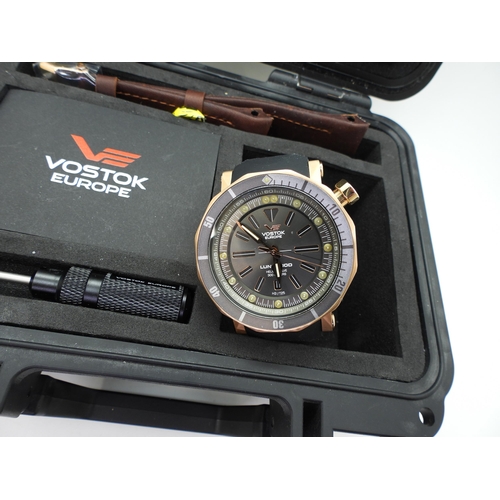 949 - A Vostok Europe, LUNOKHOD gents wristwatch, with gunmetal and silver colour dial, copper coloured ca... 