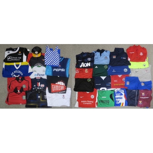 574 - A large collection of sports clothing, with teams to include St. Johnstone, Greenock Morton, Kilmarn... 