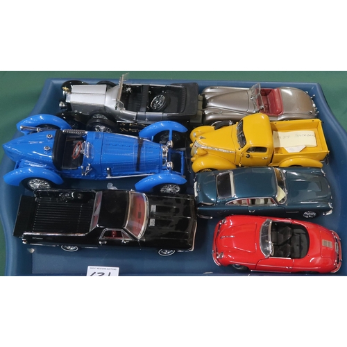 631 - A large quantity of diecast model vehicles, of mixed scale, to include the Danbury and Franklin Mint... 