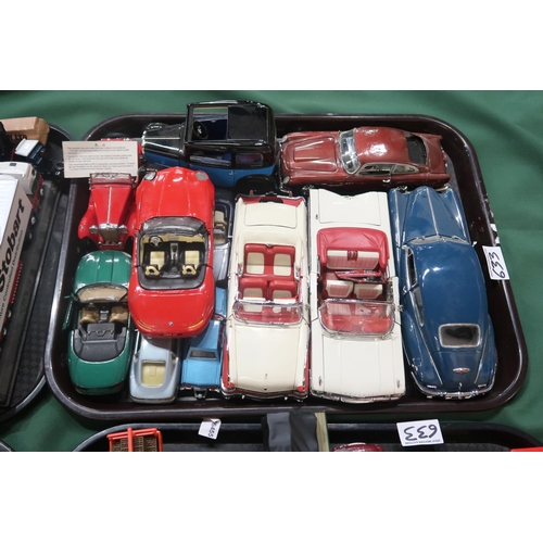 633 - A large and varied collection of diecast model vehicles, to include examples by the Danbury Mint, Co... 