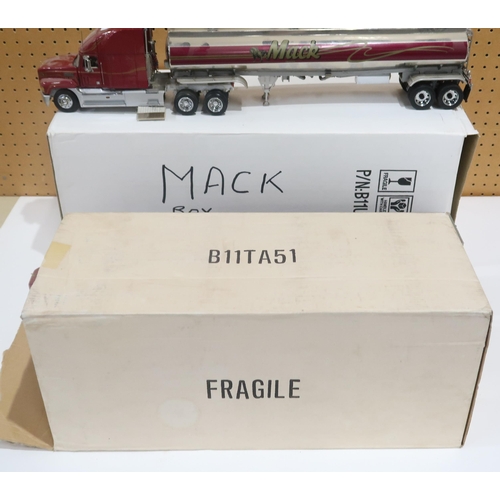 636 - Two Mack Trucks by the Franklin Mint,  with boxes for each trailer (2)