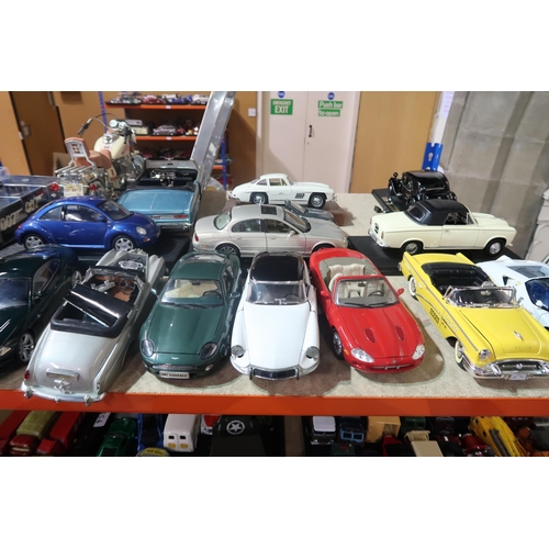 640 - A mixed collection of diecast scale model cars, to include examples by Maisto, Burago, Ertl etc., al... 