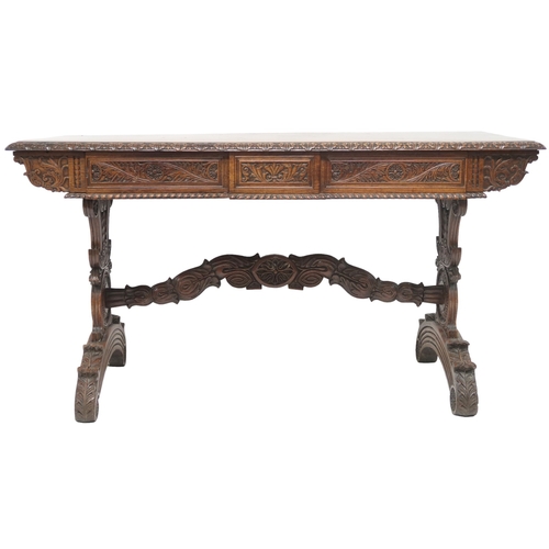 2000 - A 19TH CENTURY ANGLO-INDIAN LIBRARY TABLE rectangular top with carved foliate edges over pair of asy... 