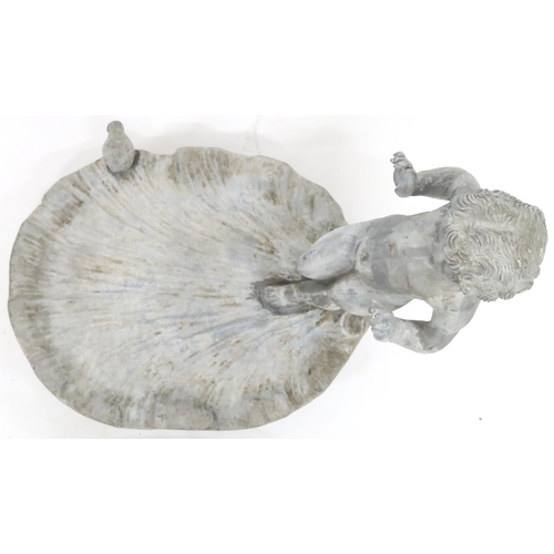 2001 - A LATE 19TH/EARLY 20TH CENTURY LEAD CHERUB BIRD BATHwith cherubim figure standing on scalloped shell... 