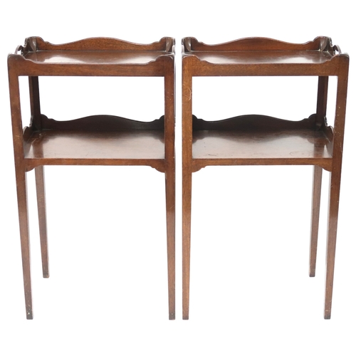 2003 - A PAIR OF EARLY 20TH CENTURY MAHOGANY TWO TIER BEDSIDE TABLES IN THE MANNER OF WHYTOCK & REID wi... 