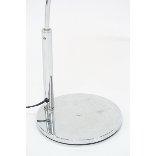 2101 - A 20TH CENTURY CHROME ARC STYLE TABLE LAMP with adjustable chromed shade suspended from arced arm on... 