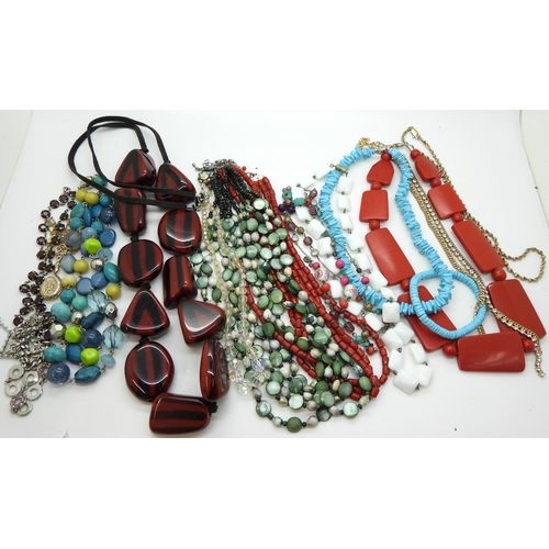 875 - Collection of costume jewellery to include a variety of beaded necklaces, vintage brooches and other... 