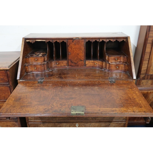 16 - A 19th century elm veneered fall front writing bureau with fitted interior over two short over three... 