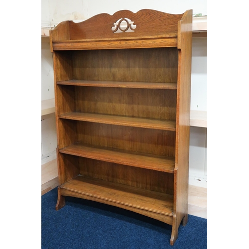 2 - An early 20th century oak open bookcase with fret cut top over four open shelves, 146cm high x 90cm ... 