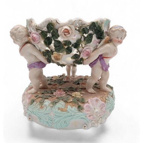 201 - A Sitzendorf centrepiece bowl modelled as three cupids amongst scrolling rocaille base, a Staffordsh... 