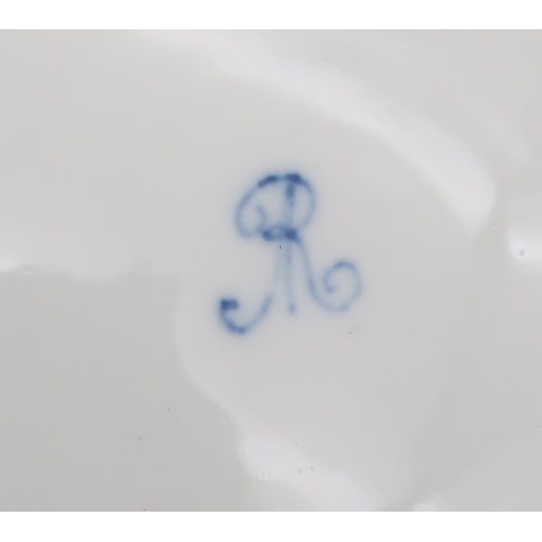 202 - A set of four Meissen style dessert plates, of lobed form, decorated with floral sprays, and an 18th... 