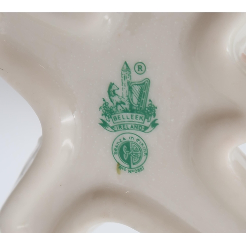 212 - A collection of Belleek, including Collector's Society vases, a 6th mark vase modelled as a tree, an... 