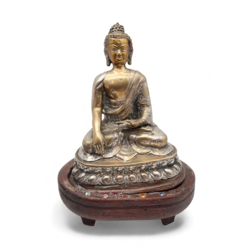 232 - A collection of Buddha statues, a silvered brass example, resin examples, a Japanese bronze vase (af... 
