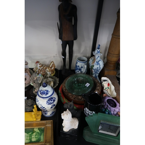 245 - A collection of decorative ceramics and glass including a hen egg nest, Black and White Scotch Whisk... 