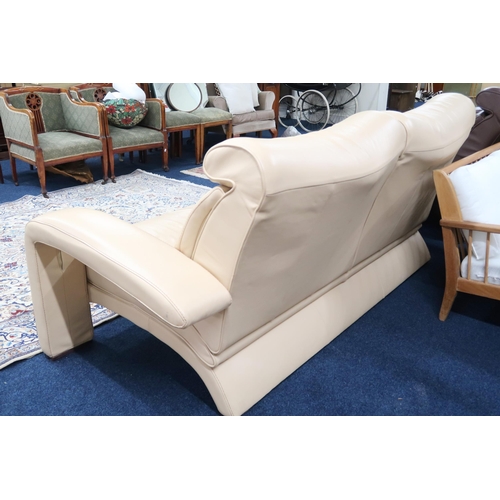 48 - A 20th century after Ake Fribytter two seater cream leather upholstered settee, 90cm high x 214cm wi... 