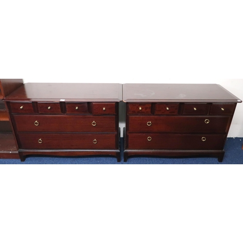 56 - A pair of mid 20th century Stag Minstrel chests of drawers, each with four short over two long drawe... 