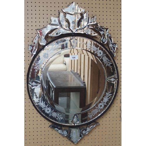 106 - A contemporary Venetian style wall mirror with floral etched mirrored framed around circular bevelle... 