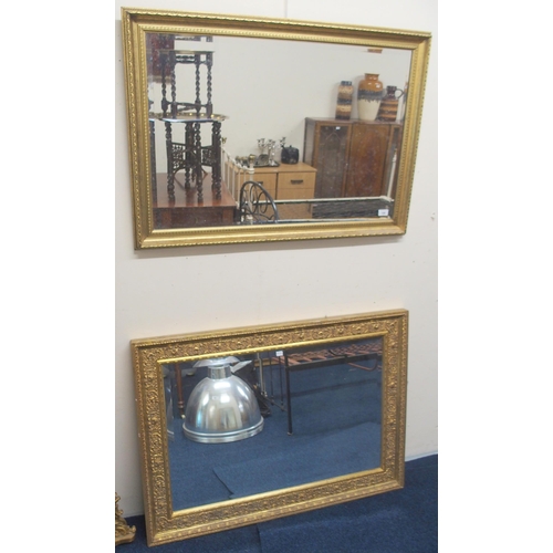 109 - A lot comprising a rectangular gilt framed bevelled glass wall mirror, 81cm high x 111cm wide and an... 