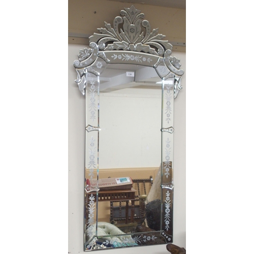 116 - A 20th century Venetian style pier mirror with floral etched mirrored frame, 115cm high x 56cm wide&... 