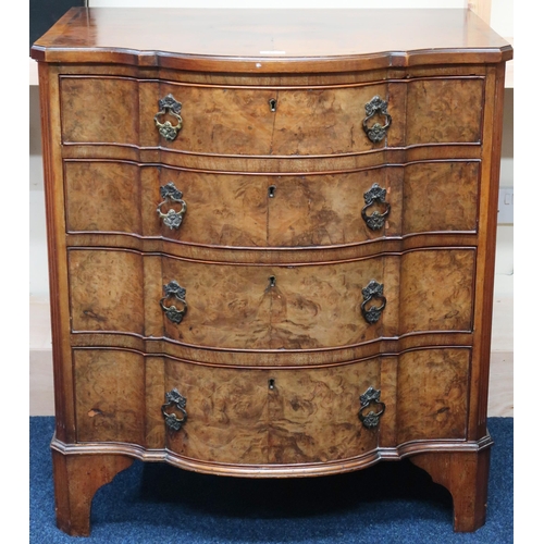 12 - A 19th century walnut veneered serpentine front four drawer chest on bracket feet, 86cm high x 77cm ... 