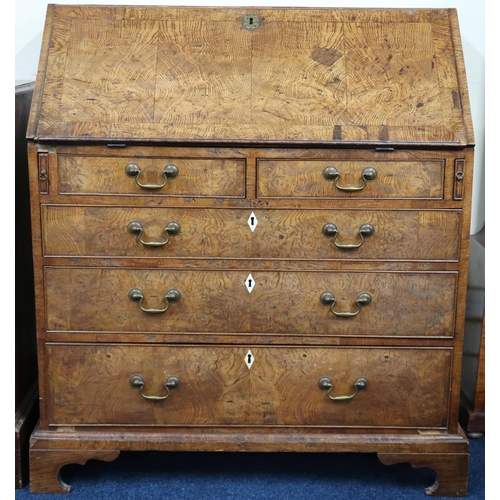 16 - A 19th century elm veneered fall front writing bureau with fitted interior over two short over three... 