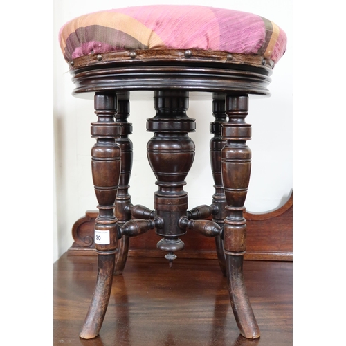 20 - A Victorian walnut adjustable piano stool with circular upholstered seat on turned supports, 51cm hi... 