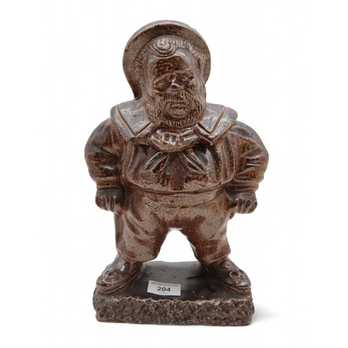 204 - A Lambeth salt glazed Tobacco Jar modelled as Jack Tar, 31cm high
