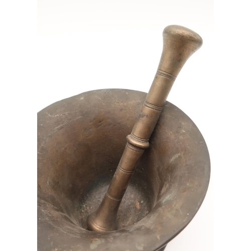 206 - An antique bronze mortar and pestle, 11cm high, together with a ship's lamp, 35cm high (2)